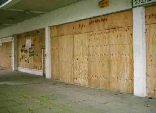 Boarded up shop fronts