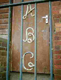 Iron letters ABC on a gate